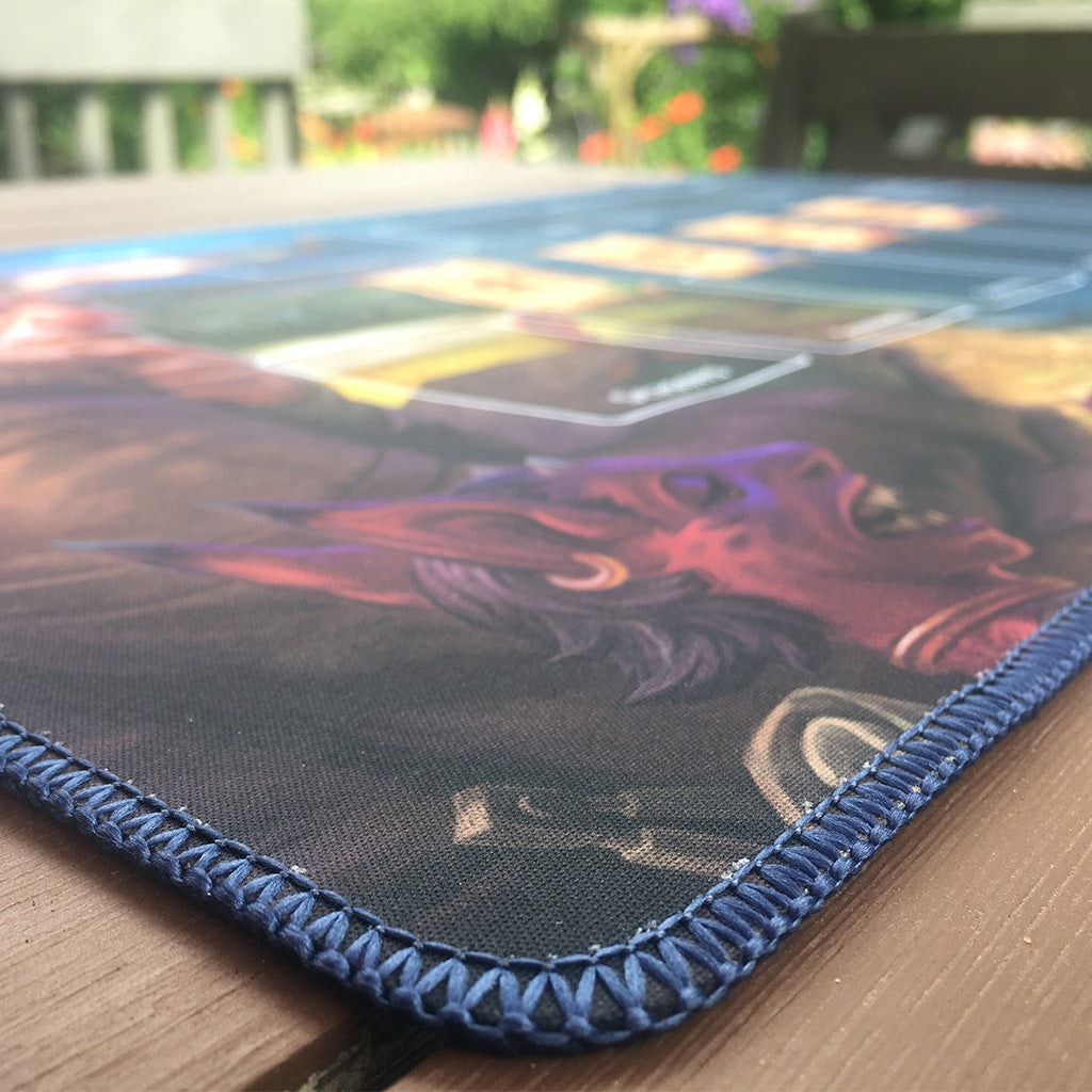 Blue side of Cartographers playmat, showing edge stiching