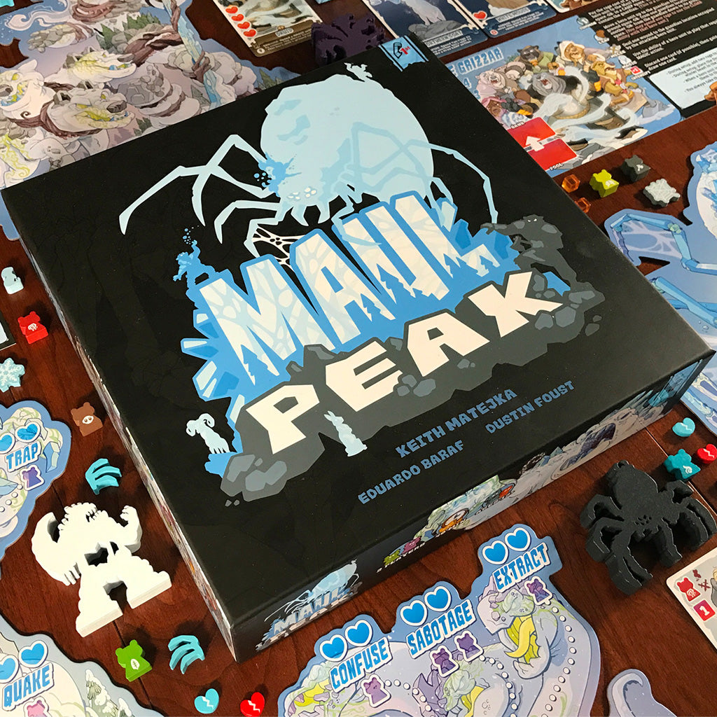 Maul Peak box on table with game components