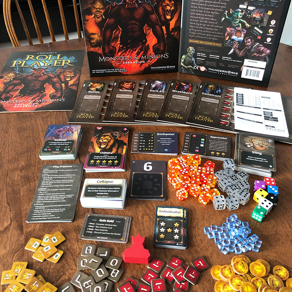 All components for Monsters & Minions expansion of Roll Player, including cards, dice, cubes, and tokens