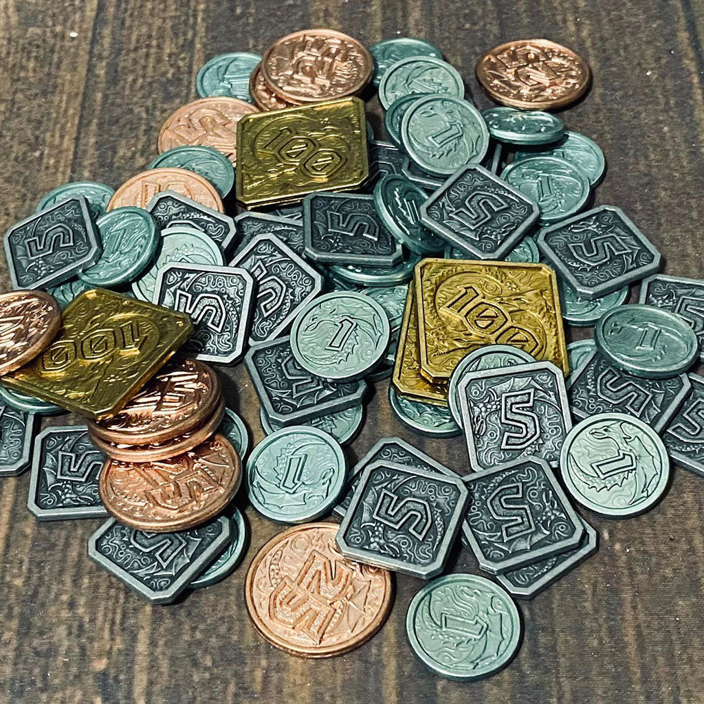 Large pile of metal coins for Dawn of Ulos in 4 denominations
