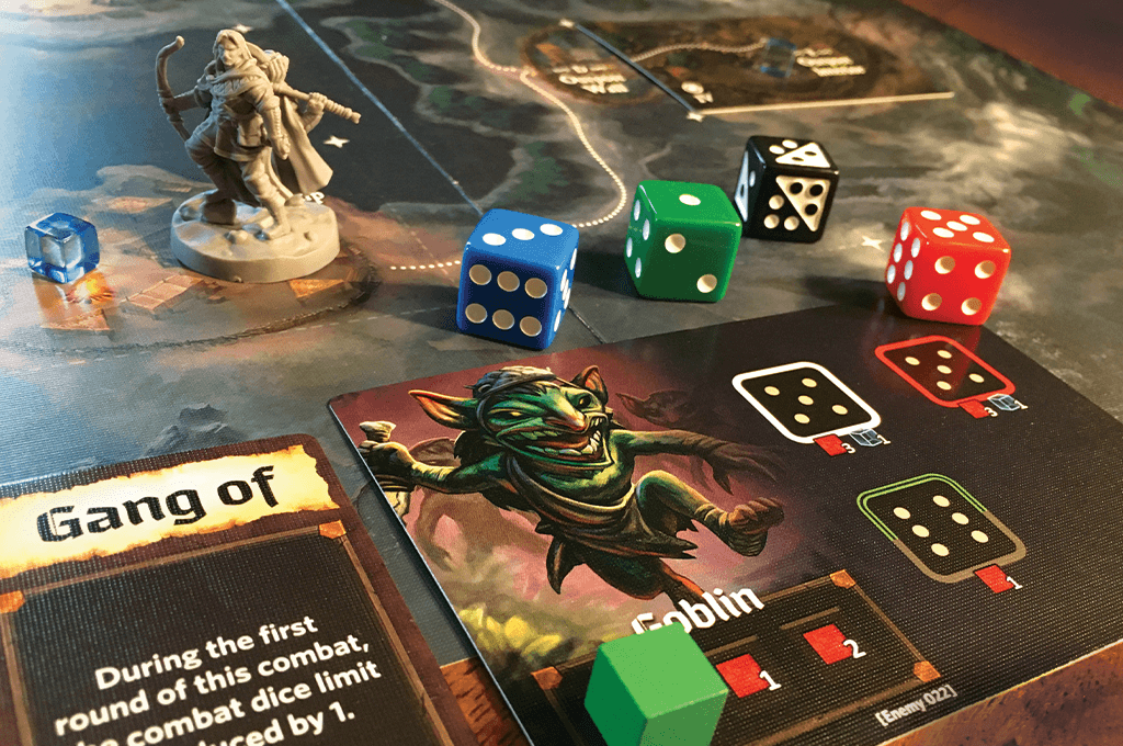 Roll Player Adventures combat against a gang of goblins with dice