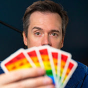 Photo of Jon Purkis with a hand of cards