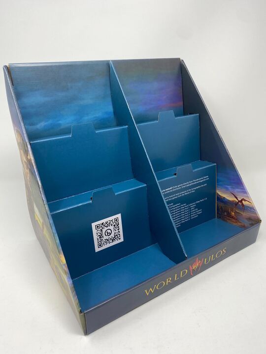 Front view of the World of Ulos cardboard product stand.